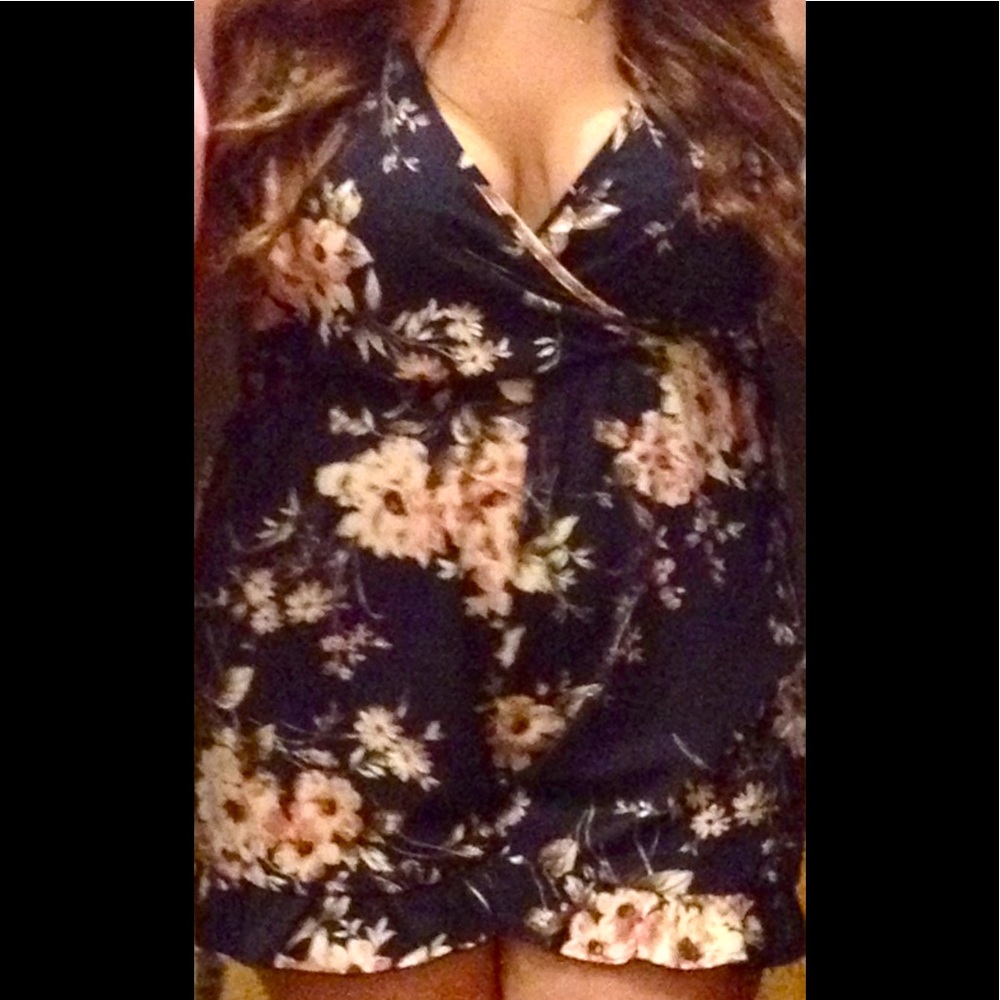 Floral short romper size L gently used